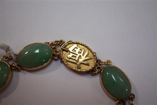 A Chinese gold and cabochon jadeite bracelet, 6.5in.